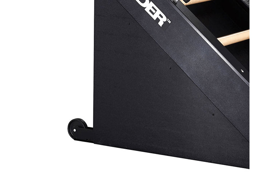 Black Jacobs Ladder climbing machine with metal frame and wooden rungs, angled view showing side profile on white background