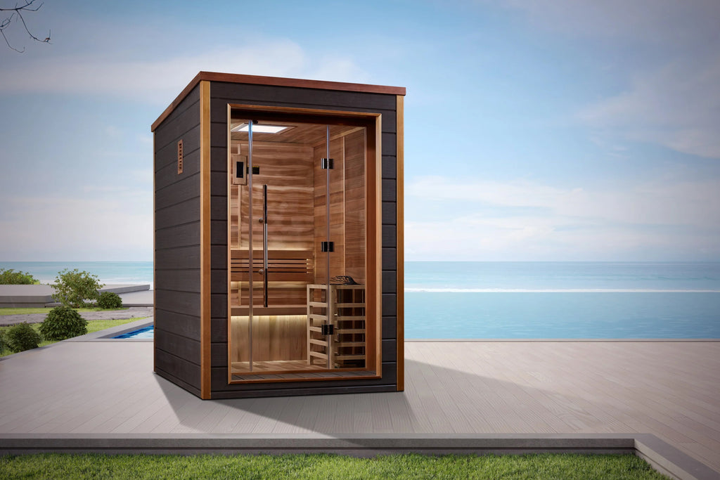 Golden Designs Narvik 2-person outdoor sauna with dark exterior, cedar wood interior, glass door, and benches on patio by oce