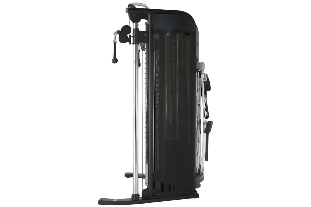 Black and silver Inspire Fitness FT1 functional trainer with dual cable towers, weight stacks, and adjustable pulleys on whit