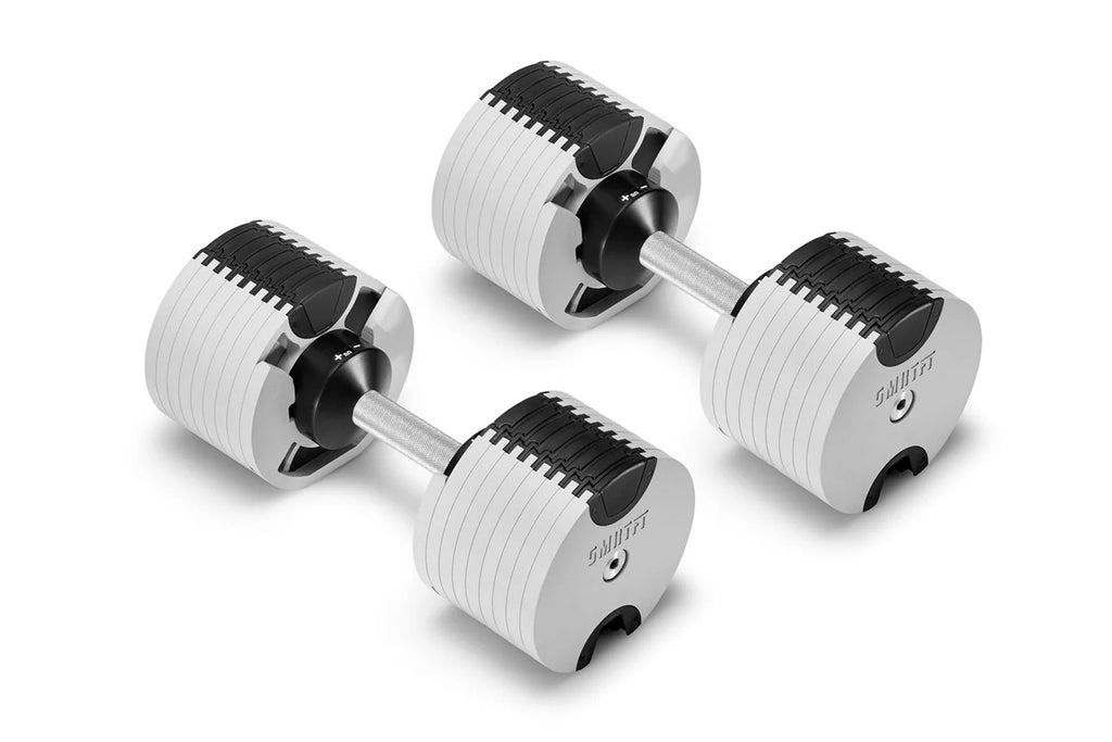 Pair of white and black adjustable dumbbells with metal handles and weight plate design, shown on white background