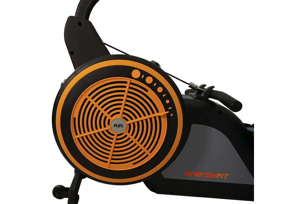 SKI-ROW AIR rowing machine with orange and black fan wheel, black frame, and gray base on white background