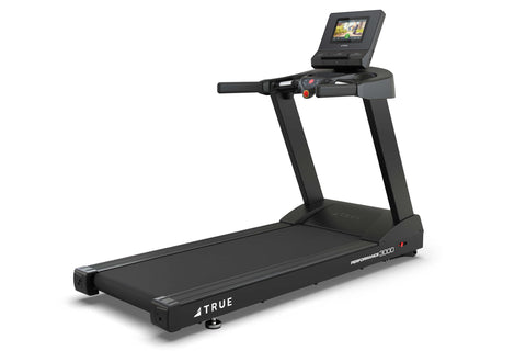 Black TRUE Performance 3000 treadmill with digital console display, handlebar controls, and cushioned running belt on white b