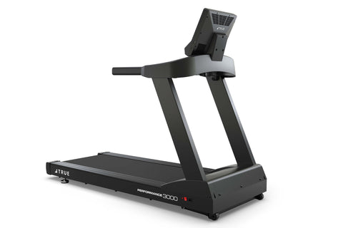 Black TRUE Performance 3000 treadmill with digital console display, handlebar controls, and cushioned running belt on white b