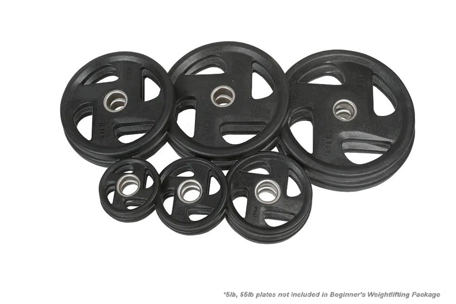 Set of six black rubber-coated weight plates in varying sizes arranged on white background