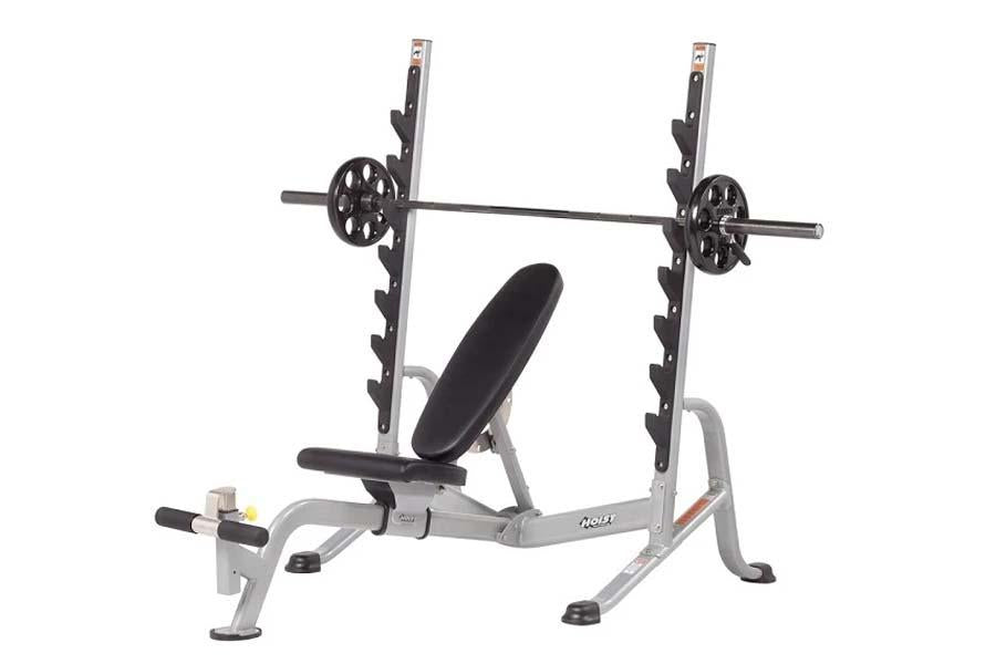 Hoist bench leg attachment outlet