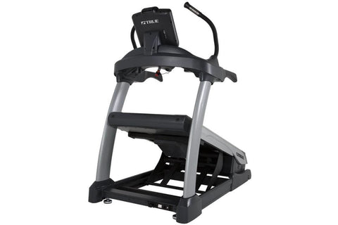 TRUE Alpine Runner treadmill with gray and black frame, black dual handlebars, and silver accents on white background