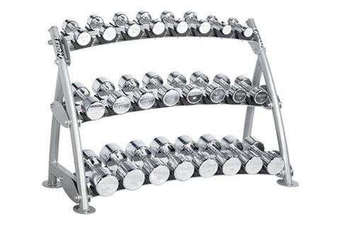 Three-tier chrome dumbbell rack with gray metal frame holding multiple pairs of silver dumbbells with white label plates